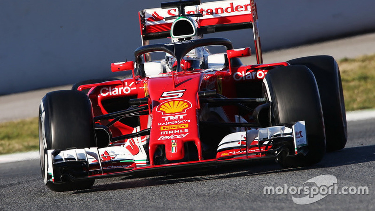 sebastian-vettel-ferrari-sf16-h-running-the-halo-cockpit-cover (1)